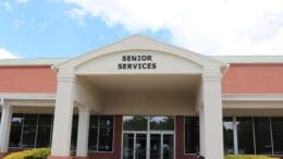 Cobb County Senior Services building with article about Tim D Lee Center reopening