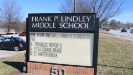 Sign t Lindley Middle School in article about MIC education forum