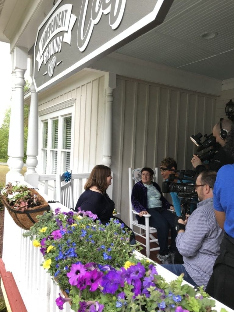 Gurvir Dhindsa interviews Lorna and her employee Gretchen as they check out the new rocking chairs and flower boxes.