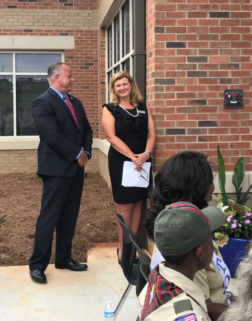 Superintendent Chris Ragsdale and Principal Dr. Amanda Richie wait to speak at the Brumby opening. (photo by Rebecca Gaunt)