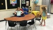 Ella (9) and Madeleine (5) Kinney explore one of the new Brumby classrooms.(photo by Rebecca Gaunt)