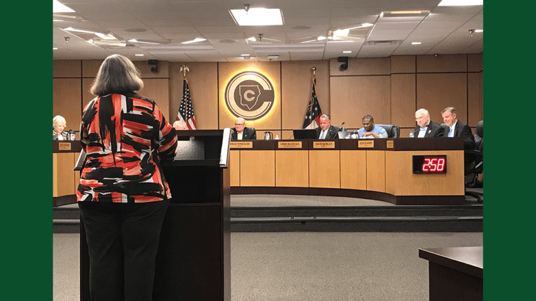 Connie Jackson addresses the board in support of the teachers raises. (photo by Rebecca Gaunt)