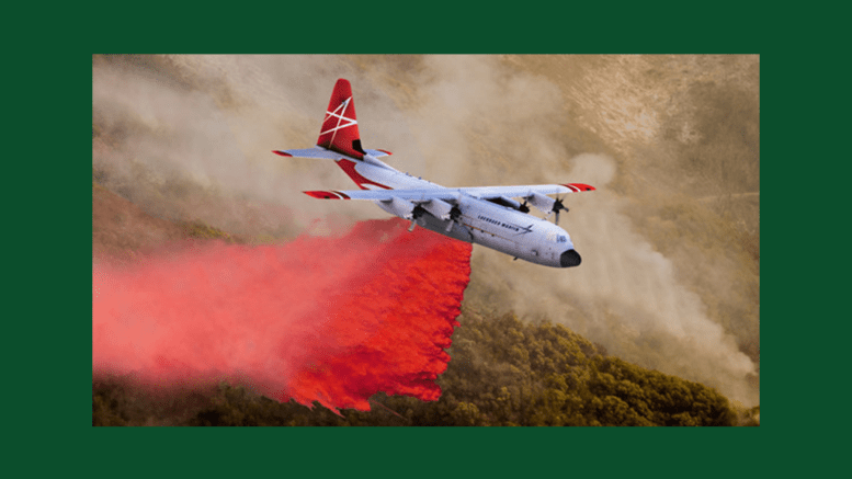 FireHerc firefighting airtanker in flight spreading a bright red flame retardant.