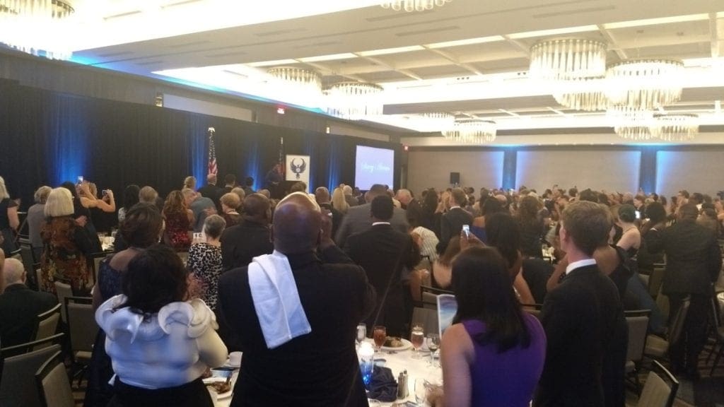 Crowd rises to applaud Stacey Abrams (photo by Haisten Willis)