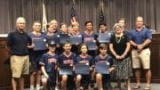 Commissioner JoAnn Birrell congratulated the Sandy Plains Prowlers travel baseball team who finished its season with a 65-11 record and five championships. (photo by Rebecca Gaunt) in article about new Cobb police headquarters