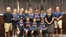Commissioner JoAnn Birrell congratulated the Sandy Plains Prowlers travel baseball team who finished its season with a 65-11 record and five championships. (photo by Rebecca Gaunt) in article about new Cobb police headquarters