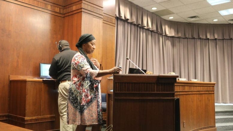 Cecile Ferguson asks for a Land Use Permit to keep backyard chickens and other farm animals as therapy for her son Josiah, who has autism (photo by Larry Felton Johnson)