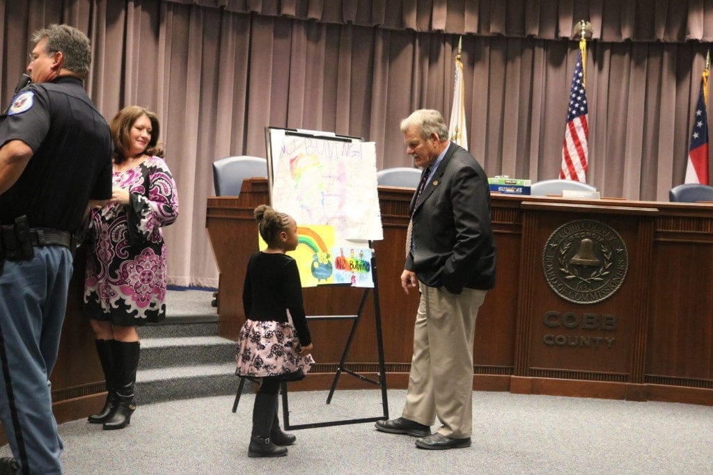 Contestant with Commissioner Bob Weatherford (photo by Larry Felton Johnson)