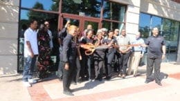 Cafe Social House ribbon cutting by owner Gloria Smith