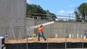 Construction worker at Riverview Landing apartments (photo by Larry Felton Johnson)