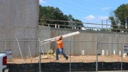 Construction worker at Riverview Landing apartments (photo by Larry Felton Johnson)