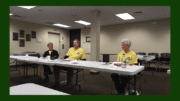 Tony Aeck Wendell Burks and Roberta Cook seated at a table