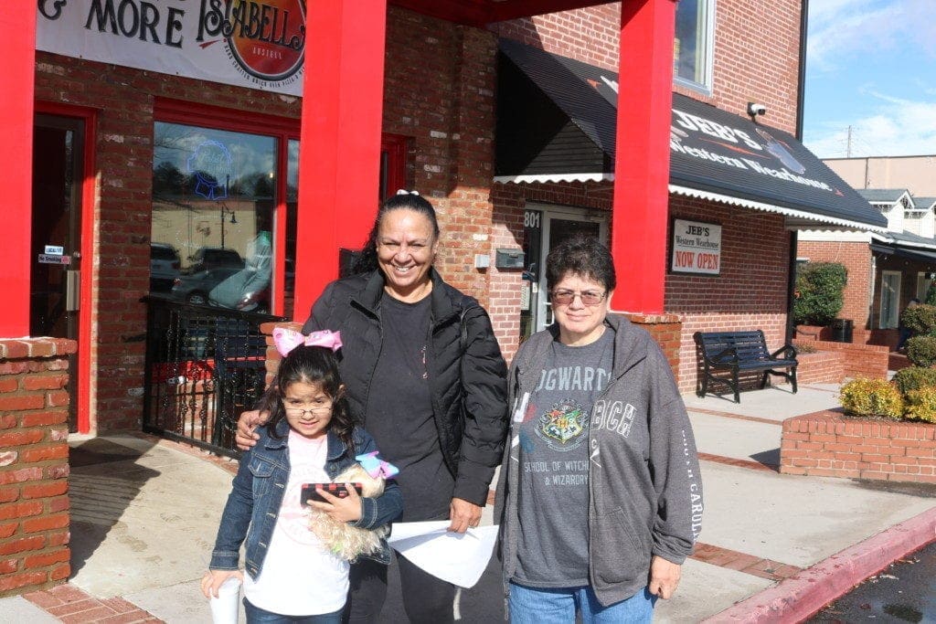 (L-R) Toni Briñseo, Natalie Mitchell, and Leticia Santos, of Mableton and Austell, at the opening of Isabella's (photo by Larry Felton Johnson)