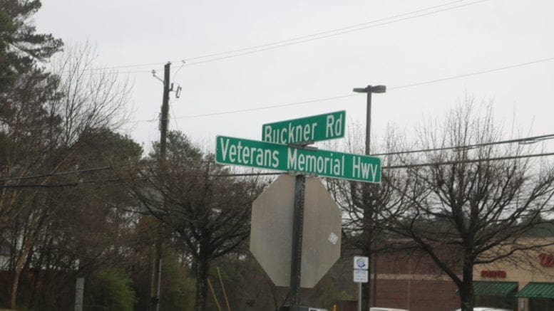 Road sign where the Bucker Road sidewalks would begin (photo by Larry Felton Johnson)