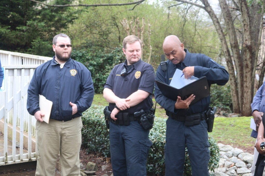 L-R, Brent Farrell from Cobb County code enforcement, Officers Conwell and Cole from community affairs in Precinct 2 of the Cobb County Police Department (photo by Larry Felton Johnson)