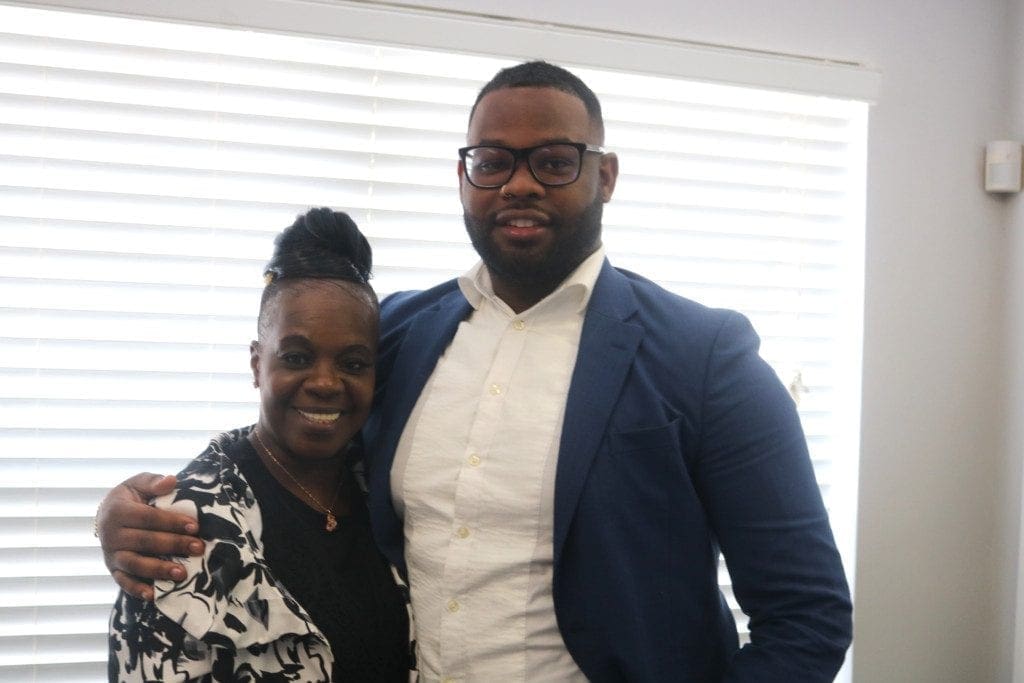 Deborah Wynns, a resident at Kingsley Village, and Prince Carter, the property manager (photo by Larry Felton Johnson)