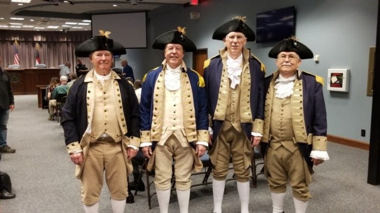 Stallings Howell, Bill Floyd, Wayne Brown and Shep Hammack in American Revolutionary War uniformsfrom the Sons of the American Revolution at the Cobb Board of Commissioners meeting to receive a proclamation for Patriots Day