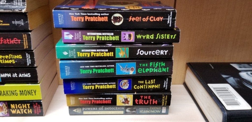 A stack of Terry Pratchett novels from the sci-fi room in the Book House (photo by Larry Felton Johnson)