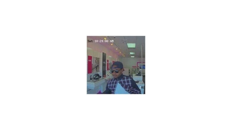 video capture of the T-Mobile armed robbery suspect (photo courtesy of the Cobb County Police Department)