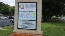 Sign in front of Cobb & Douglas Public Health on County Services Parkway in article about Cobb & Douglas Public Health hiring