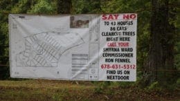 A sign put up by neighbors along Buckner road opposed to the annexation and rezoning of a 12.7 acre property by Smyrna