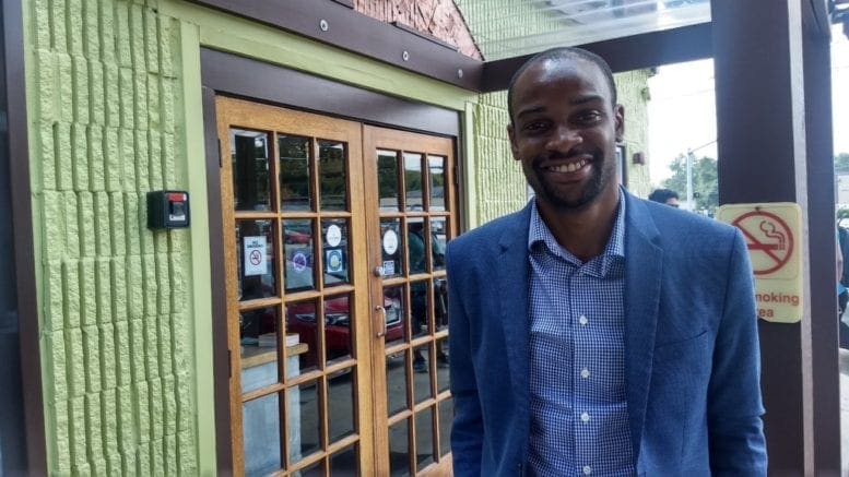 Smyrna mayoral candidate Ryan Campbell outside Rev Coffee Roasters