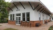 Smyrna History Museum building is a replica of a one-story wooden train station. In article Smyrna History Museum re-opens