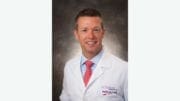 Dr. Danny Branstetter in white medical jacket