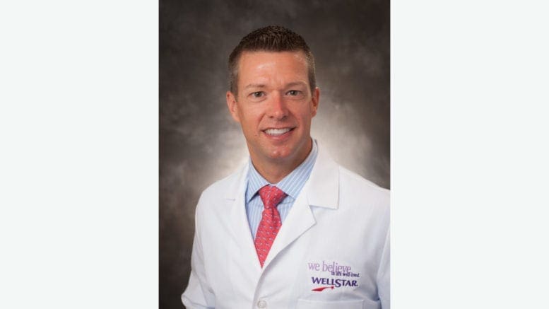 Dr. Danny Branstetter in white medical jacket