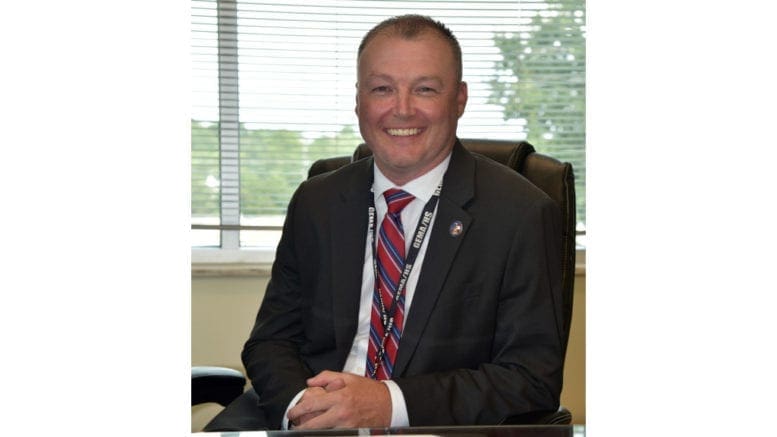 Chris Stallings at his desk