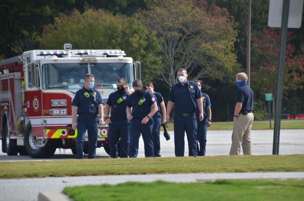 Cobb firefighters in front of fire truck