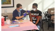 CDPH staff member Nicholas Hayes receives COVID-19 vaccine at the Marietta Public Health Center