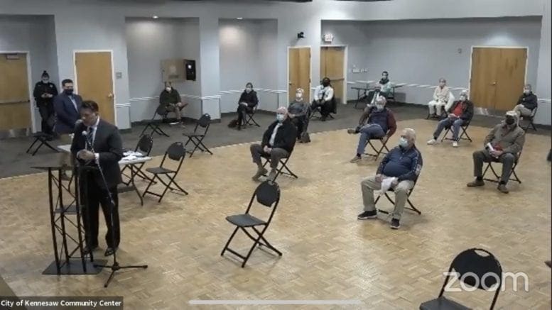 Due to social distancing protocols, overflow audience members attended the public hearing for the Lockhart Drive rezoning via Zoom from the Ben Robertson Community Center. (Asst. City Manager Marty Hughes at the microphone).
