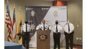 Sheriff Craig Owens and part of his command staff announce major reforms to the Cobb sheriff’s office. Pictured from left to right: Col. Temetris Atkins, Sheriff Craig Owens, Chief Deputy Rhonda Anderson and Maj. Steven Gaynor all wearing dress white shirts surrounding lectern