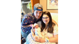 Kristen and Matthew Reiman from Austell holding baby Alora
