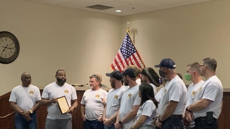 Alderman Tim Houston (far left) with Acworth public works employees.