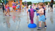 Children playing on a splash pad