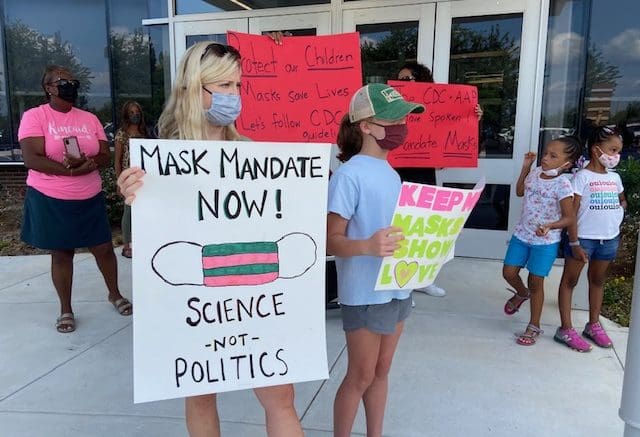 Parents demonstrate for a mask mandate