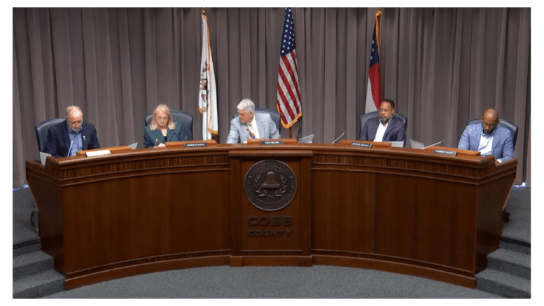 Cobb's five planning commissioners at the desk
