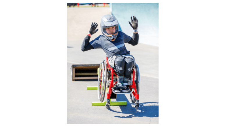 Young athlete in wheelchair in competition