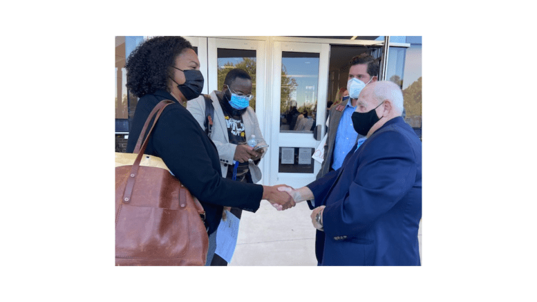 Board members Charisse Davis and Tre’ Hutchins and state Rep. Mike Wilensky spoke with Holocaust survivor Herschel Greenblat before the meeting (photo by Rebecca Gaunt)