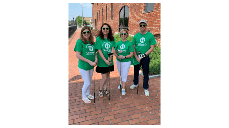 From L to R- Allison Gruehn (Committee Member); April Wright (co-chair), Pam Younker (Community Development Officer for Cobb County for Children's) Chris Godfrey (co-chair)