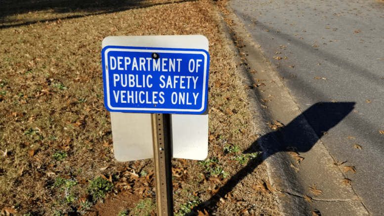Small sign stating Department of Public Safety Parking only