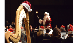 Santa conducts an orchestra