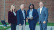 Standing in a line left to right: Sharon Mason, CEO of the Cobb Chamber; Tommy Allegood, Mayor of Acworth; Tia Amlett, 2021 Acworth Citizen of the Year; John Loud, 2021 Cobb Chamber Chairman