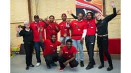 a group of Beyond the Bars participants along with staff lined up for a group photo