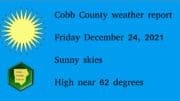 Sunny sky graphic with a sun above a Cobb County Courier logo followed by text: Cobb County weather report Friday December 24, 2021 Sunny skies High near 62 degrees