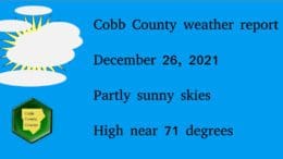 An image of a sun obscured by clouds with the Cobb County Courier logo underneath, followed by text:Cobb County weather report December 26, 2021 Partly sunny skies High near 71 degrees