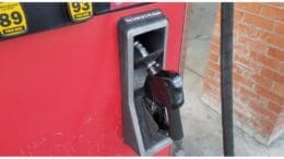 Gasoline pump resting in its cradle used in articles about Georgia gasoline prices