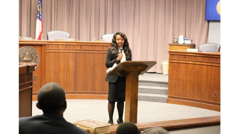 Cobb BOC Chairwoman Lisa Cupid at lectern during her second swearing-in ceremony